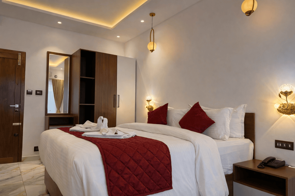 Deluxe Room with wardrobe at Hotel Materhorn, Kovalam